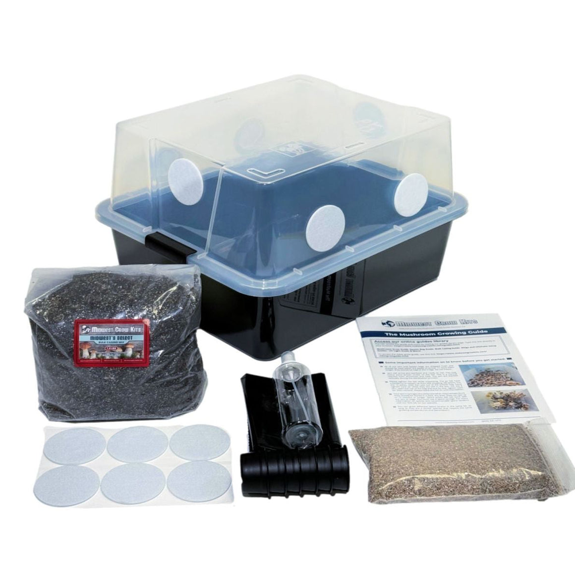 Mushroom growing kit: clear monotub, bulk casing mix, grain spawn, spray bottle, filters, and growing guide on white background.