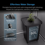 Black 50L water tank with a plant on top, featuring a clear side panel and transport wheels.