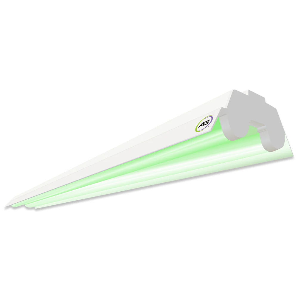 White Active Grow dual T8 4FT LED grow light emitting a vibrant green spectrum for plant growth.