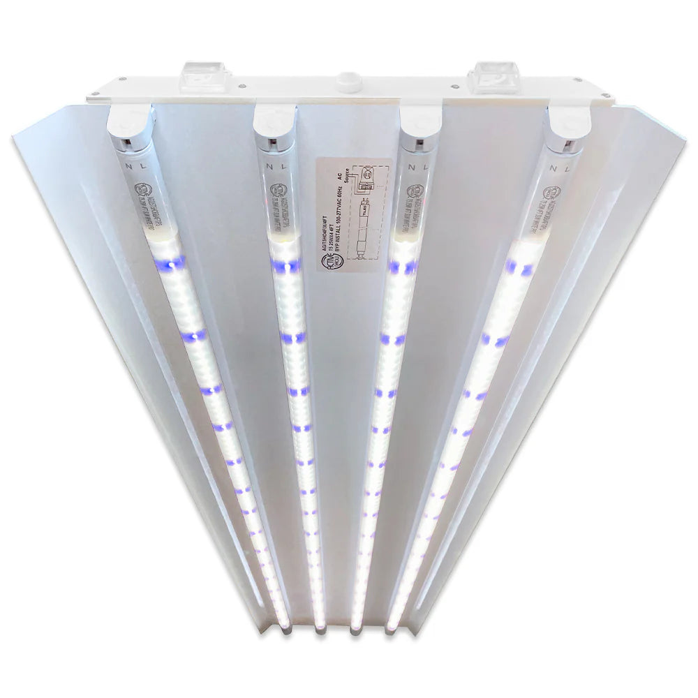 White 4-lamp T5 HO 4FT LED mushroom grow light fixture with glowing blue-sun full spectrum tubes.
