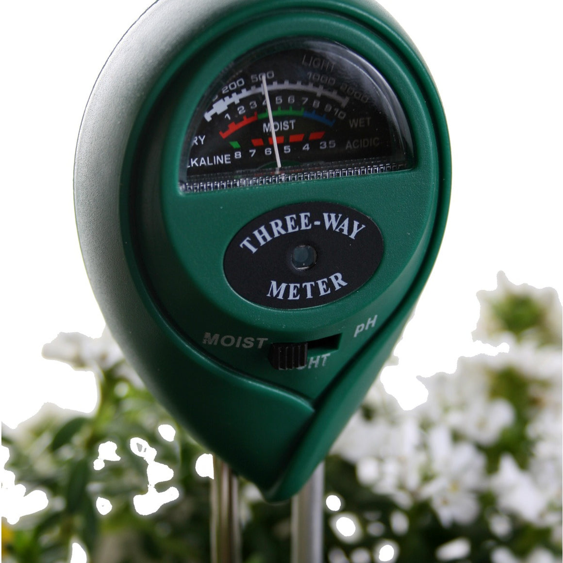 Green 3-way meter measures light, moisture, and pH for plants.