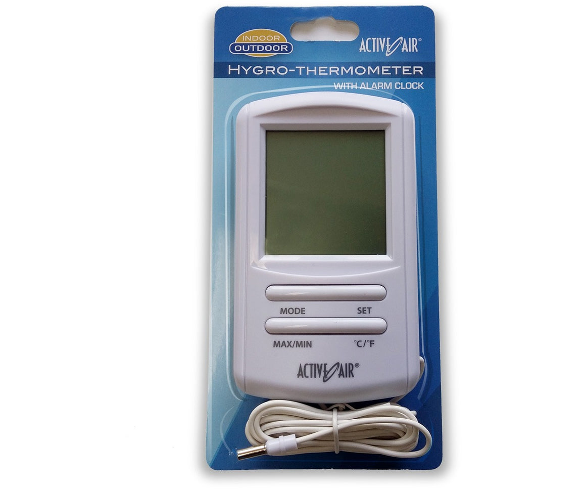 Active Air hygro-thermometer with alarm clock, digital display, and white cord.