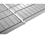 Silver hydroponic tray with ribbed surface and connecting channel.