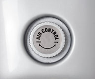 A silver rotary knob with 