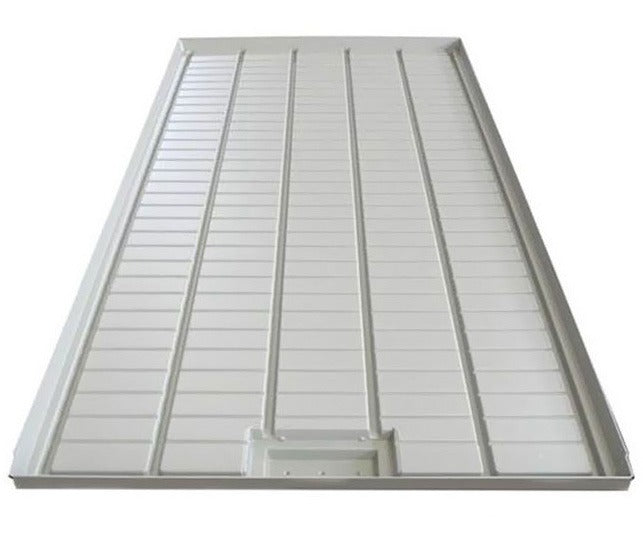 White hydroponic grow tray with raised channels and a drain outlet.