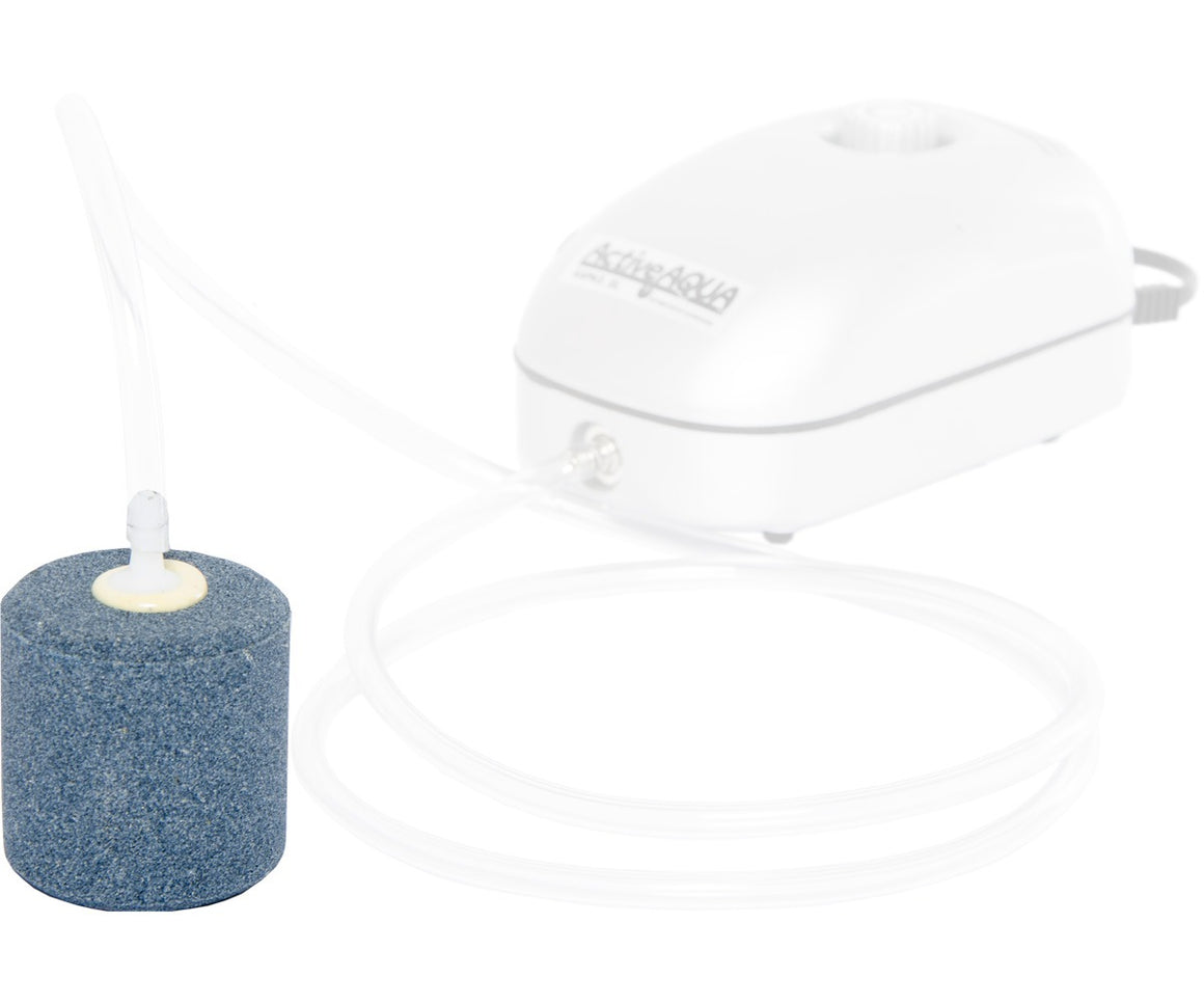 Active Aqua cylindrical air stone with tubing connected to a white air pump.