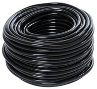 Coiled black tubing, a common hydroponic or aquarium accessory.
