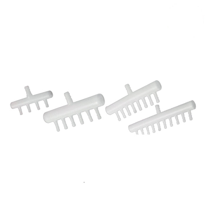 Four white plastic aquarium air diffusers with multiple outlets on a white background.