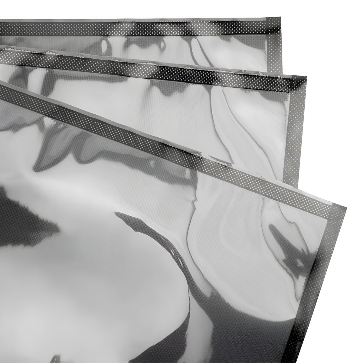 Black vacuum seal bags with dotted seal lines stacked.