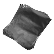 Stack of black, precut vacuum seal bags with a shiny seam.