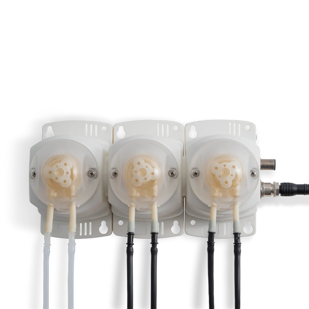 Bluelab PeriPod M3 three-head peristaltic dosing pump with clear and black tubing attached.