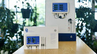 Bluelab Pro Controller Wi-Fi box with a mounted unit and sensors, featuring a blue display with readings for conductivity, temperature, and pH.