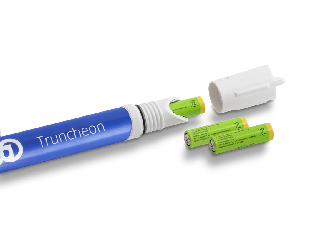 A blue Truncheon meter with the cap and two batteries.