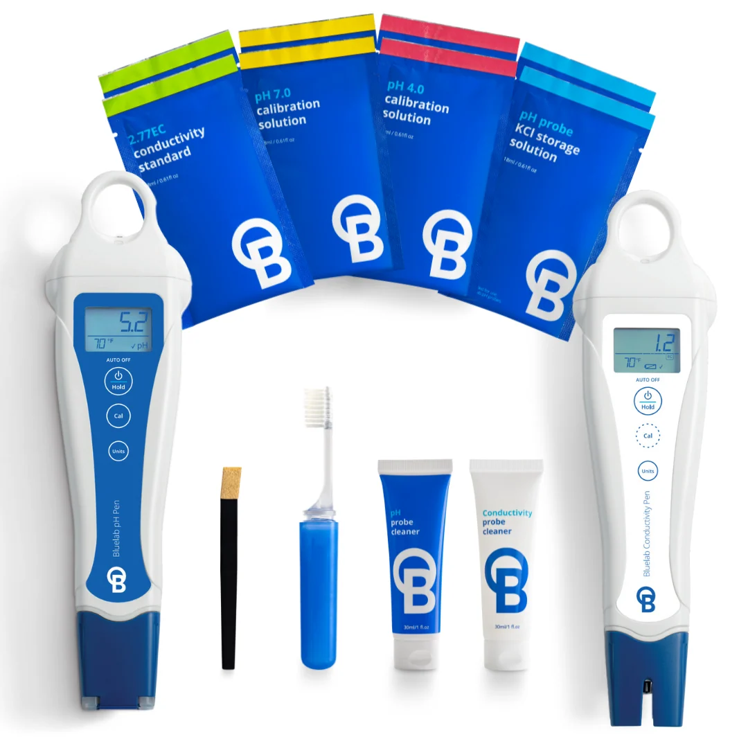 Bluelab pH and conductivity pens with calibration solutions, probe cleaner, toothbrush, and cleaning tool.