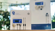 Bluelab pH Controller Wi-Fi box with product image on a table.