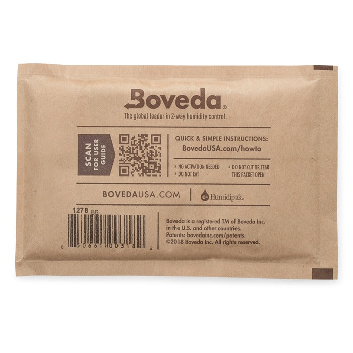 Boveda 2-way humidity control packet on brown paper packaging, "Boveda" logo, instructions, QR code, and barcode.