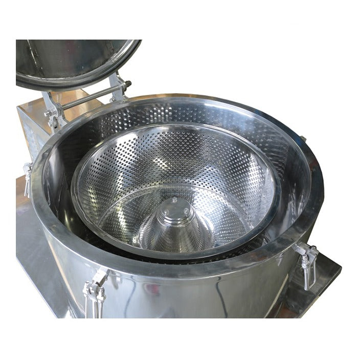 Close-up of a stainless steel industrial centrifuge with a perforated basket and lid.