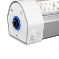 Close-up of a white LED grow light with a blue connector and 