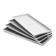 Stack of five silver rectangular trays with a textured logo reading 