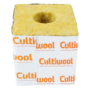 Yellow Cultiwool rockwool growing block for hydroponics, a fibrous cube with a central planting hole.
