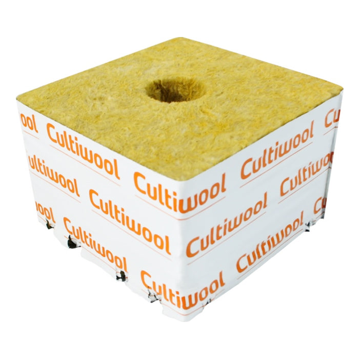 Yellow Cultiwool rockwool hydroponic growing cube with central hole, wrapped in white film.