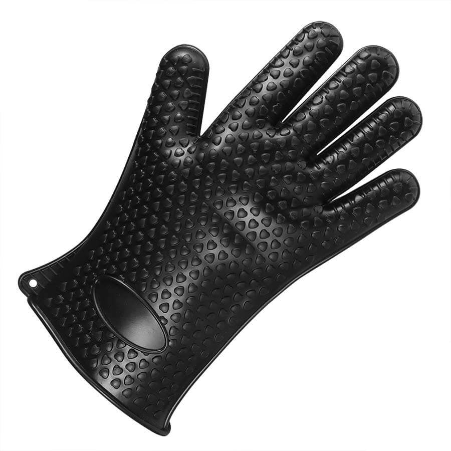 Black silicone oven mitt with raised circular texture pattern and thumb grip.