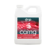 Drip Hydro CA-MG supplement bottle with water droplets on a red flower.