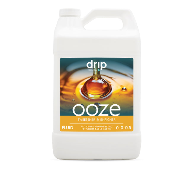 Drip Hydro Ooze Gallon: Sweetener & Enricher fluid bottle with amber liquid drip.
