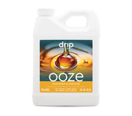 Drip Hydro Ooze Sweetener & Enricher fluid in a white quart jug.