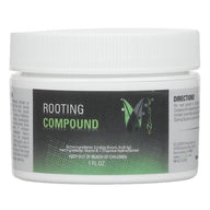 White EZ-CLONE Rooting Compound 1 fl oz jar with a black and green label showing active ingredients.