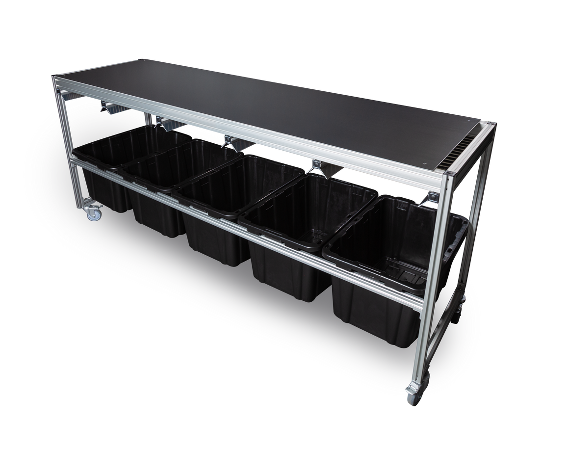 A rolling cart with a black tabletop holds five black plastic bins.