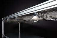 Close-up of a silver EZTrim Bud Sorter with metal racks and black clips attached.