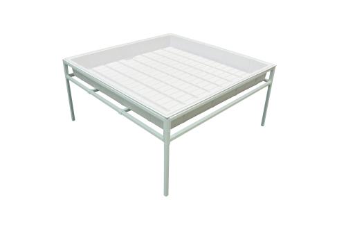 White, square hydroponic tray with ribbed insert on a light grey metal stand.