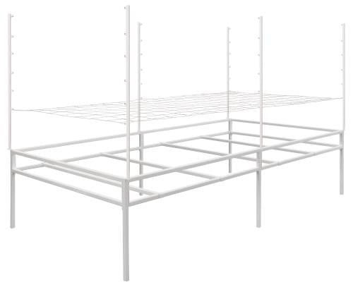 A white metal trellis support system with two wire shelves and four vertical posts with pegs.