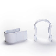 Two white U-shaped plastic clips with rounded edges and open bottoms on a white background.