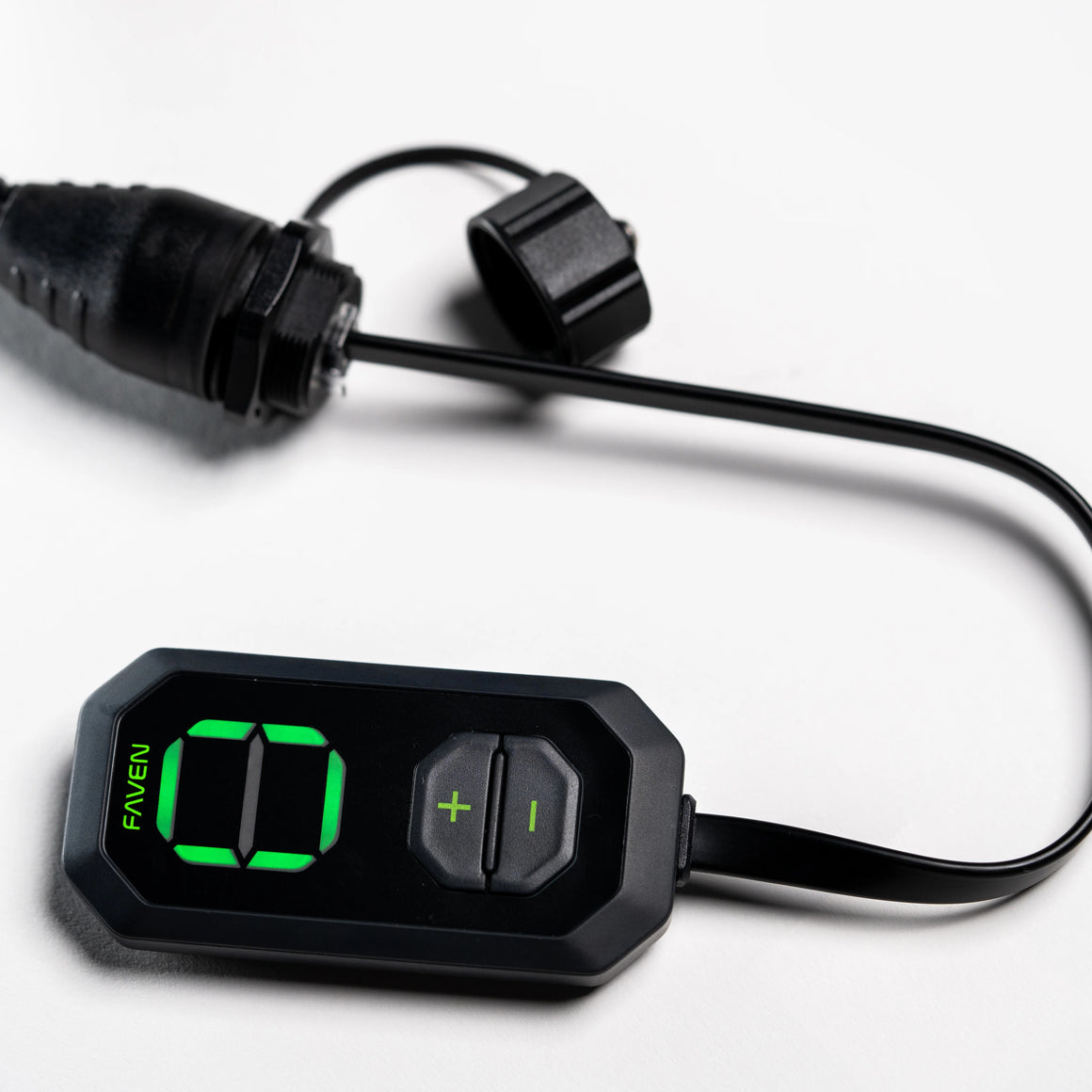 Black Faven lighting controller with green LED display showing '00', plus/minus buttons, and cord.