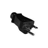 Black power plug with two metal prongs and grounding pin, angled view.