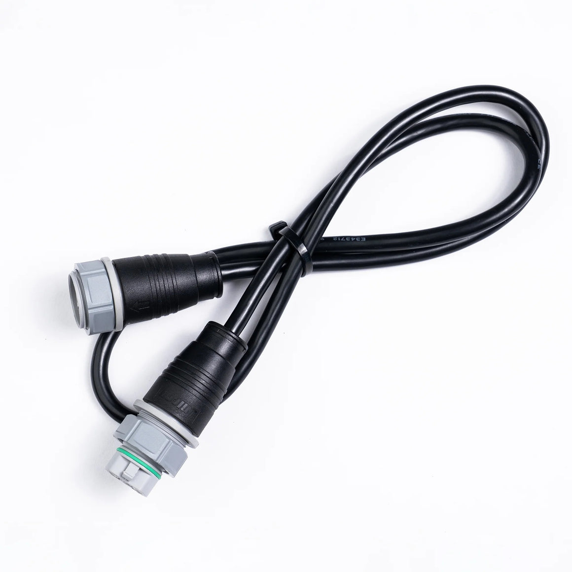 Black cable with two connectors: one gray with a green ring, one black with a gray nut.