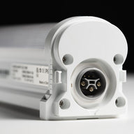 Close up of white LED fixture end with IP6 and CE markings, and a 4-pin connector.
