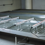 Row of white LED lights with red glow, labeled 