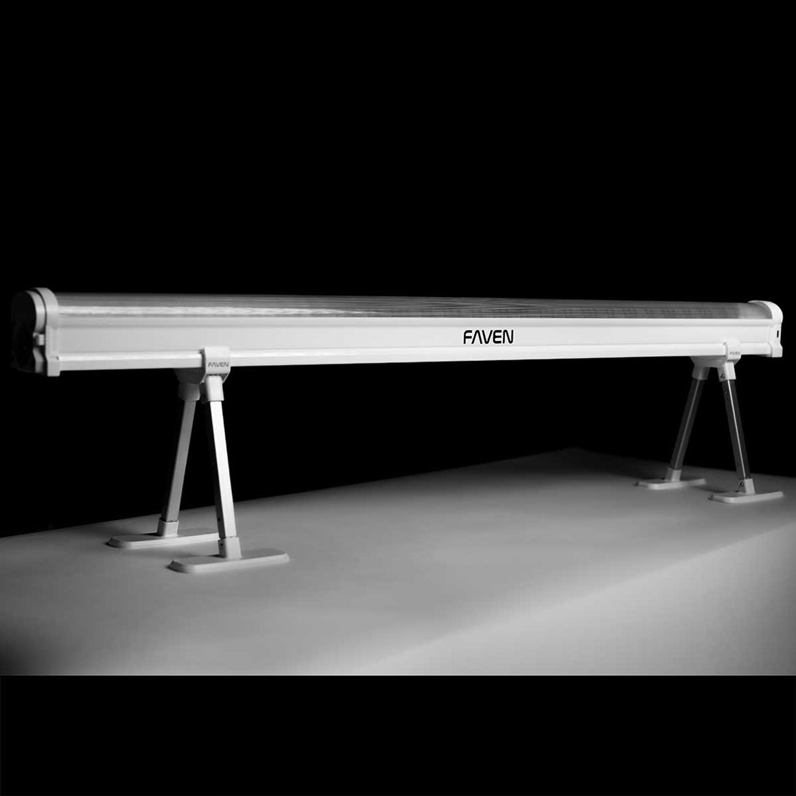 Faven R6/R8 under-canopy light, white linear fixture on silver legs, logo visible, dark background.