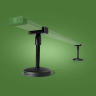 FloraFlex Under Canopy Adjustable Stand Setup with a long green bar supported by two black adjustable stands on a green background.