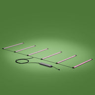 FloraFlex 6-bar 720W far red LED grow light setup, connected to a power supply, on a green background.