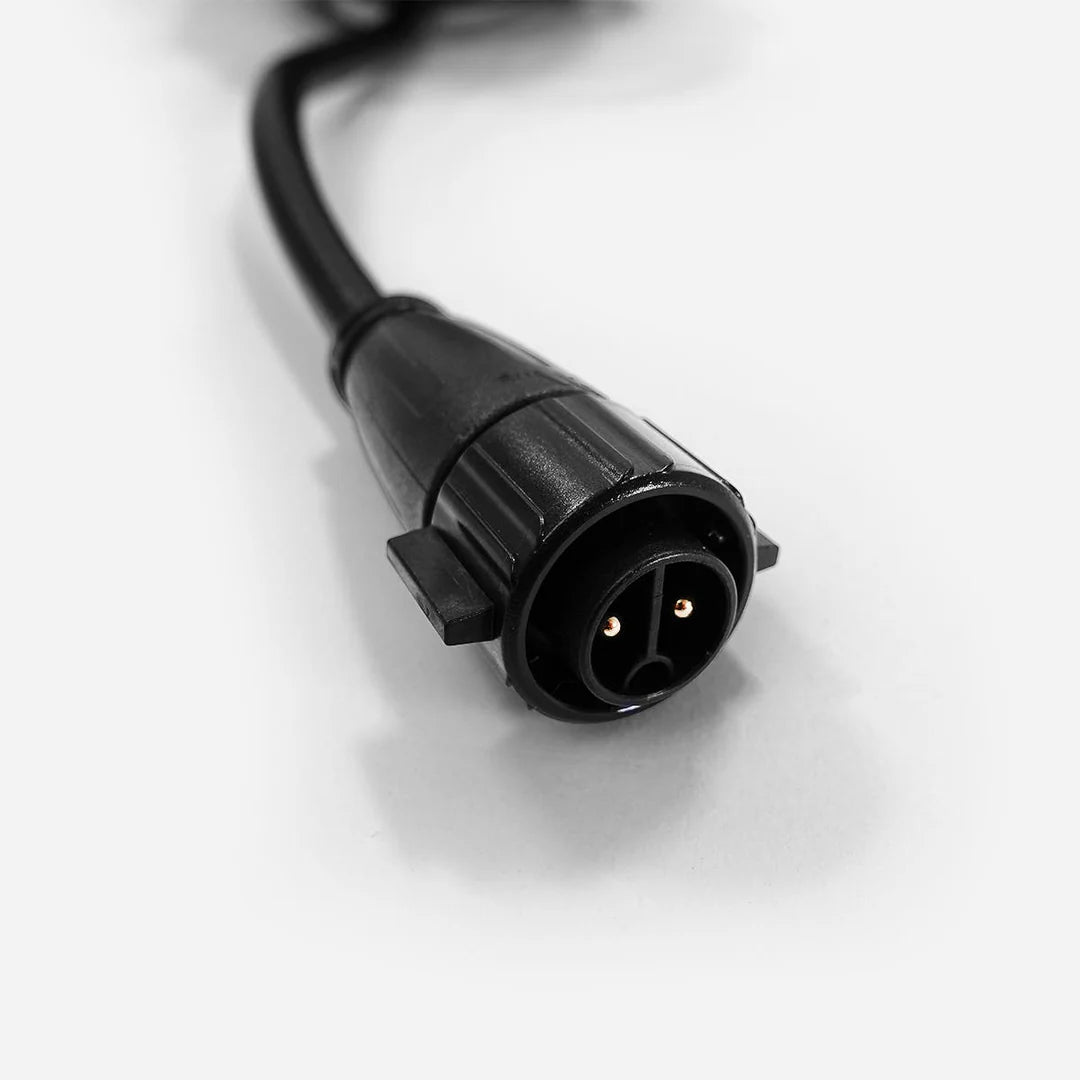 Black M19 2-pin connector on a 14AWG extension cord, with gold pins visible on a white background.