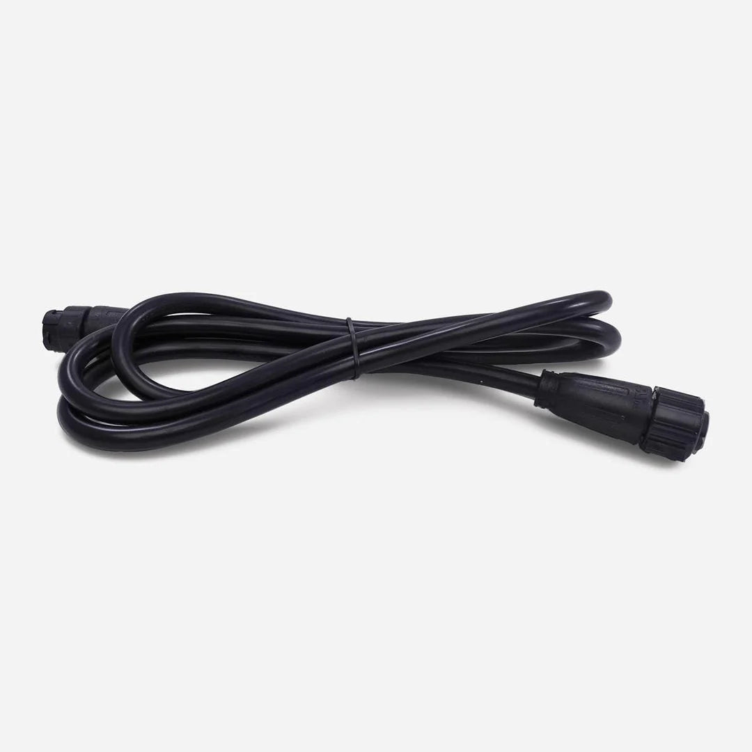 Coiled black FloraFlex 12 AWG extension power cord with weatherproof male and female connectors.
