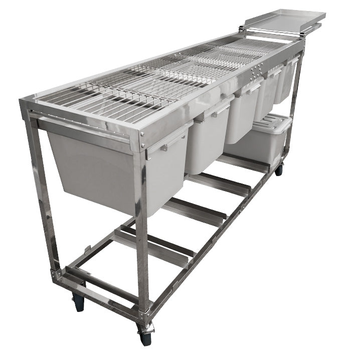 Commercial stainless steel harvest sorting table with grated top, multiple bins, lower storage, and casters.