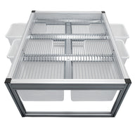 Aluminum frame stationary harvest sorting system with metal wire grate and white plastic collection bins.