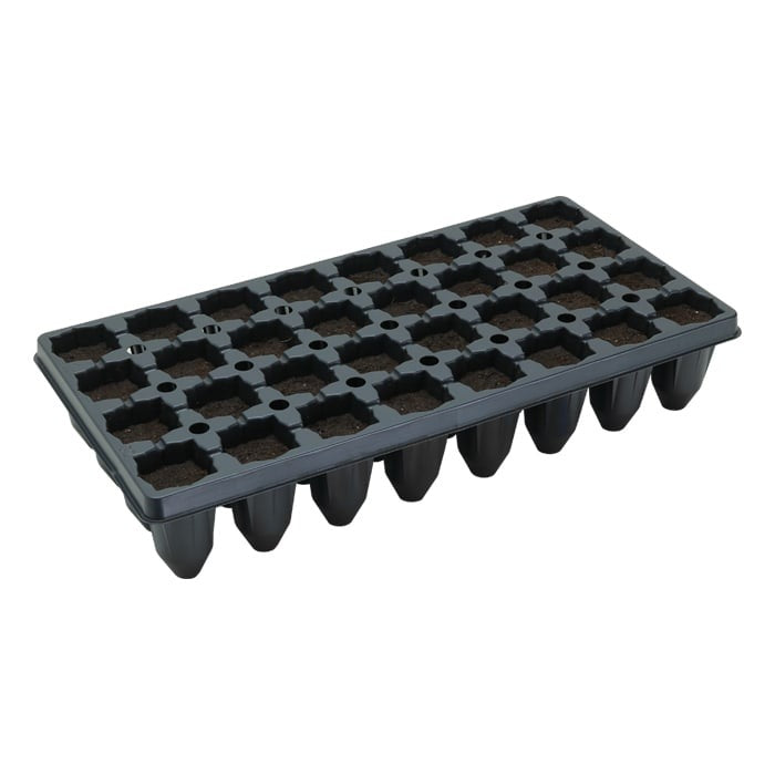 Black 32-cell seed starter tray filled with soil, ideal for starting seedlings.