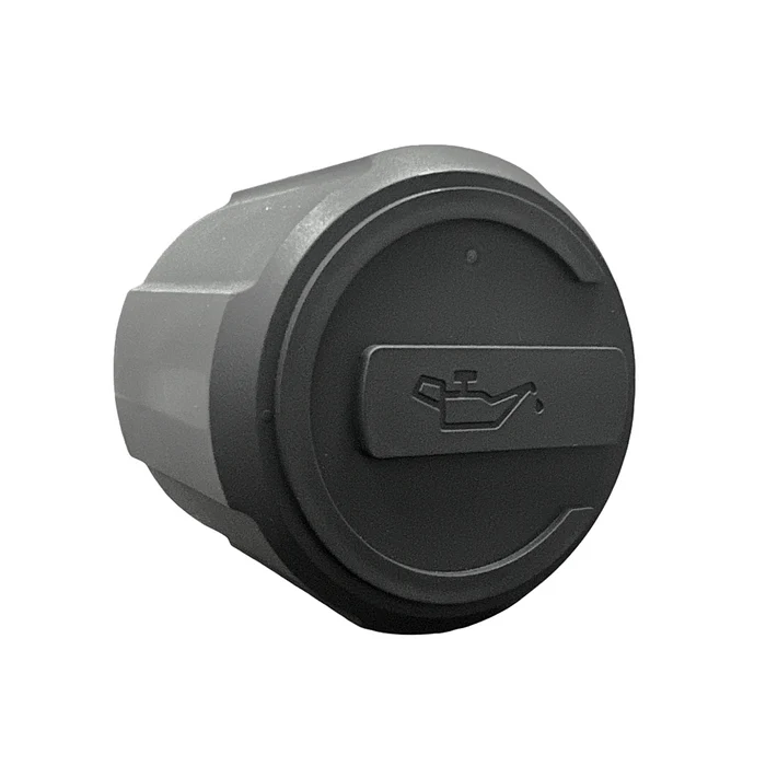Dark gray oil cap with an oil can symbol, part of a Harvest Right Premier Pump Demister.