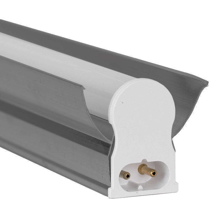 T5 LED fixture with reflector, white end cap, and brass pins.